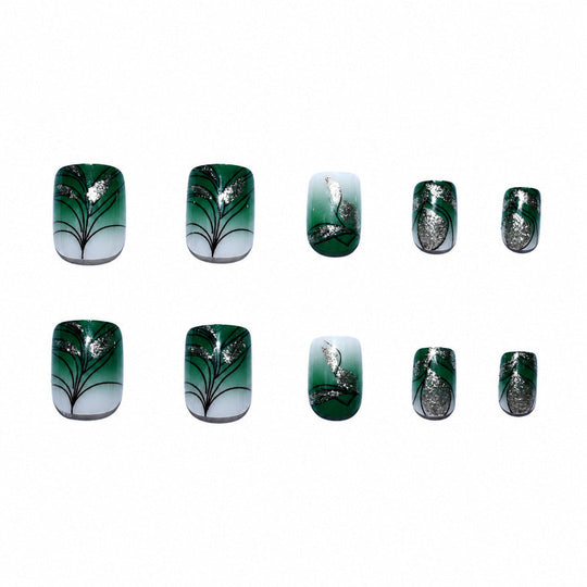 Kvinders kunstige negle med planteinspireret design 4